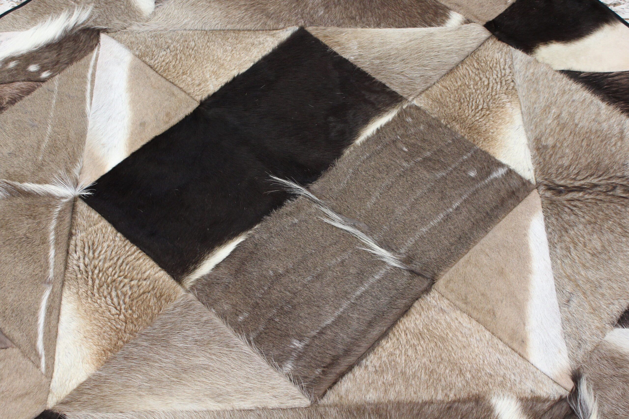 patchwork rug using african back skins